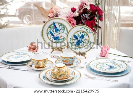 Hermes "Toucan" Porcelain Dinnerware Service and Siesta