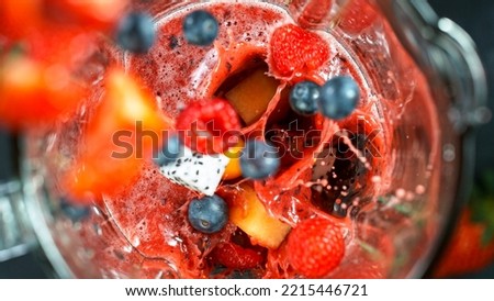 Green fresh smoothie blended in blender, top view. Healthy eating concept. Royalty-Free Stock Photo #2215446721