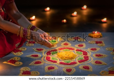 Happy Diwali - Diya lamps lit during diwali celebration Royalty-Free Stock Photo #2215458869