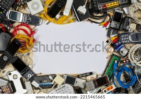 Old out of date technology. Electrical items no longer of any use. Obsolete electrical waste for recycling. Space for Text. Royalty-Free Stock Photo #2215465665