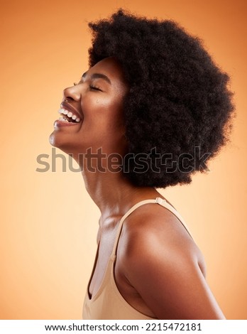 Cosmetics, black woman and smile with natural beauty with brown studio background being confident, happy and with afro. Makeup, female and African American girl being proud, laugh and clear skincare. Royalty-Free Stock Photo #2215472181