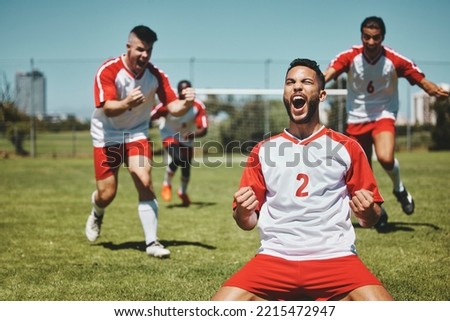 Team, success and winner by soccer player celebration during game at soccer field, happy, cheering and victory. Sport, achievement and goal by football team running and celebrating football field win Royalty-Free Stock Photo #2215472947