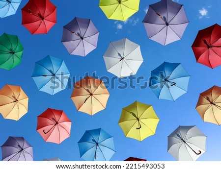 umbrellas as street decoration.umbrellas as street decoration. colorful umbrellas against the blue sky. High quality photo
