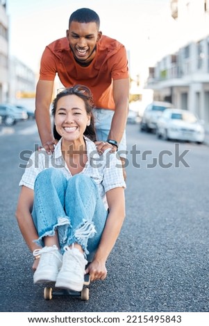 Skateboard, young couple and fun, street style and playful sport date in urban cityscape. Gen Z fashion, man and woman happy, skateboarding and diversity, together and bonding outdoors in the city.