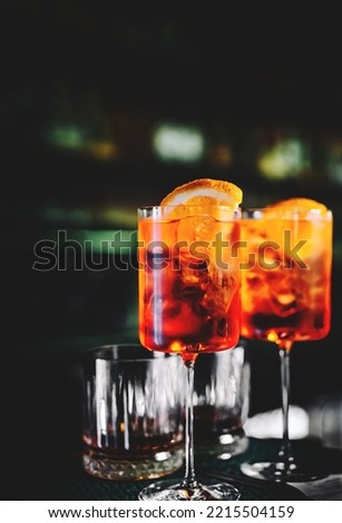 Aperol Spritz Cocktail in glass on bar counter