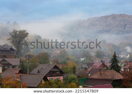 misty morning over the village
