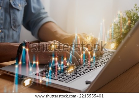 Casual Businessman Using or Typing Laptop and Slant Online Product Icon, Color Stock Market Bar Chart and Line Graph Trend. Consumer Discretionary Sector and Financial Economy Concept