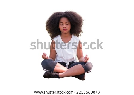 African American little girl doing meditate yoga asana with eyes closed on white background. Kids girl practicing doing yoga Royalty-Free Stock Photo #2215560873