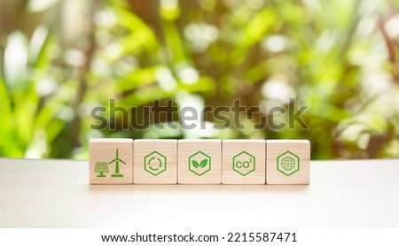 Renewable energy and long-term development The concept of lowering CO2 emissions. Green businesses that use renewable energy can help to mitigate climate change and global warming. Royalty-Free Stock Photo #2215587471