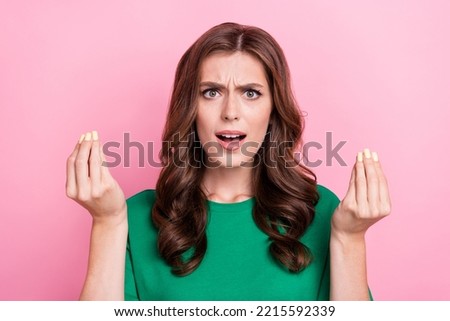Photo of unsatisfied aggressive pretty woman show fingers ask why lost cash money bankrupt bad mood isolated on pink color background Royalty-Free Stock Photo #2215592339