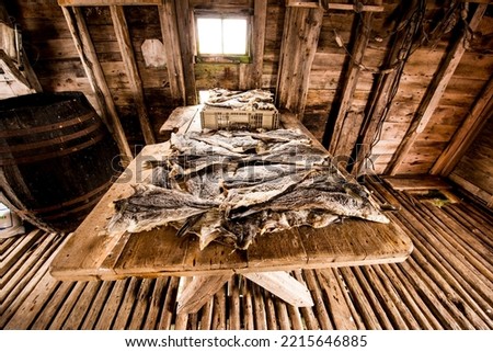 Salted cod drying curing in Joe Batt's Arm, Fogo Island, Newfoundland, Canada. Royalty-Free Stock Photo #2215646885