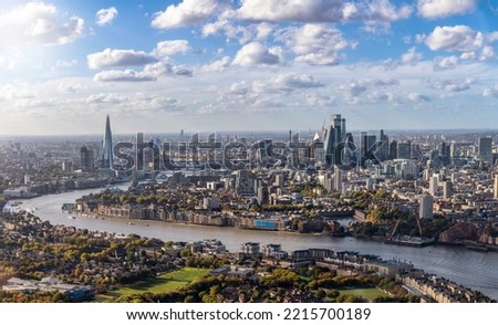 High panorama of the London skyline along the river Thames from London Bridge until the City during a sunny day, United Kingdom 