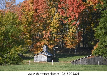 Amish sugarhouse in the autumn countryside Royalty-Free Stock Photo #2215706321