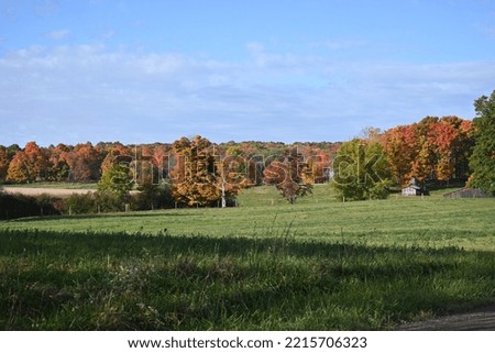 Amish sugarhouse in the autumn countryside Royalty-Free Stock Photo #2215706323