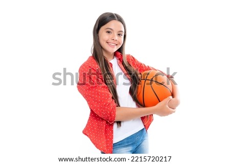 Teenage school child girl basketball player standing on white background. Portrait of happy smiling teenage child girl.