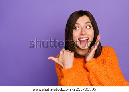 Photo of impressed positive lady open mouth look direct thumb finger empty space isolated on violet color background