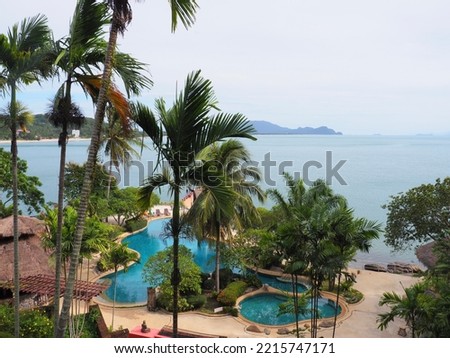 Beautiful view of the seaside swimming pool in the southern resort of Thailand.  vacation concept