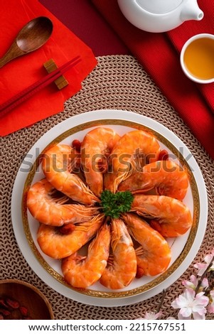 Top view of delicious shrimp soaked in Chinese wine named drunken shrimp for lunar new year's dishes. Royalty-Free Stock Photo #2215767551