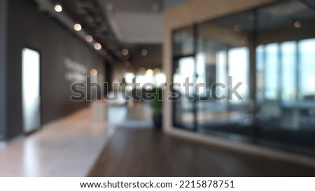 Blur focus of Fashion and modern office interiors. Front view of a loft open space office interior. Blur background.