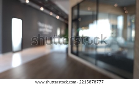 Blur focus of Fashion and modern office interiors. Front view of a loft open space office interior. Blur background.