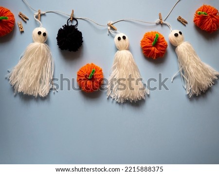 Funny ghosts and string pumpkins. Decorations for the holidays with their own hands, Halloween.