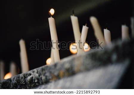 burning candles at catholic chapel
