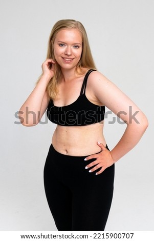 plus size girl in sport outfit isolated 
