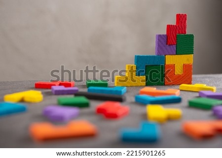 Creative idea solution - business concept, jigsaw puzzle close up. Leadership and teamwork strategy success. Royalty-Free Stock Photo #2215901265