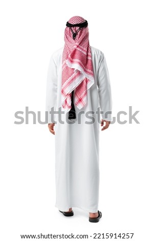 Back view of an Arab man standing on white isolated background Royalty-Free Stock Photo #2215914257