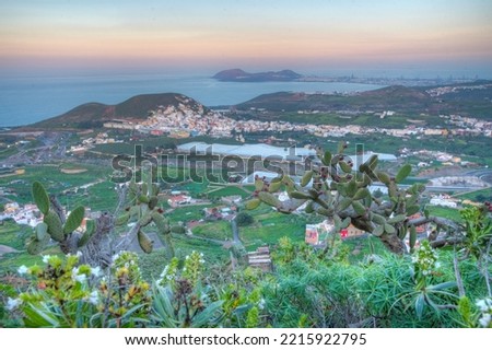 Sunset view of coastline of Gran Canaria stretching towards Las Palmas, Canary Islands, Spain.