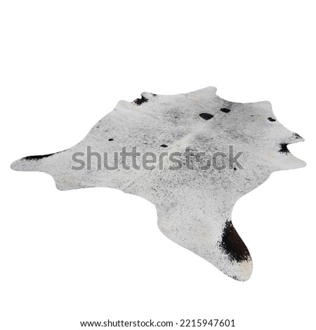Angled animal skin rugs on a white background           