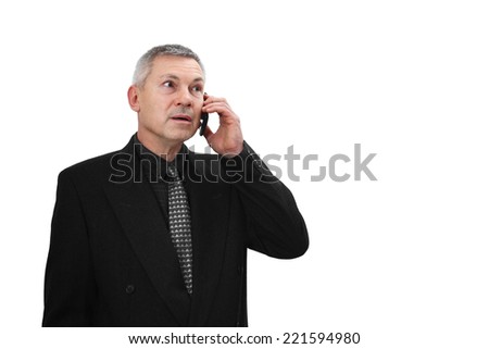Middle age man in business black suit calls by mobile phone isolated on white background with copy space on right with copy space