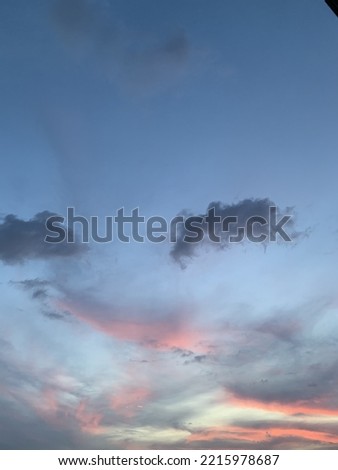 Pink and gray stratus clouds are caused by scattering light in the atmosphere beautiful at Bangkok, Thailand.no focus