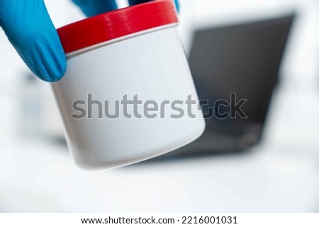 Plastic container for chemicals in science lab on computer background
Jar for chemicals with space for text online shopping chemicals