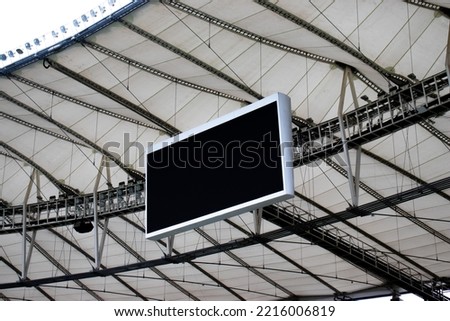 Screen of a sports stadium installed above the stands.
