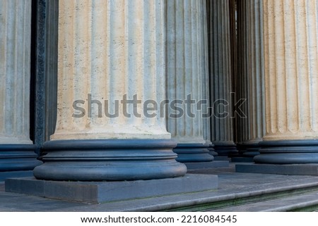 Historical granite columns of the cathedral, details, stripes, textured background