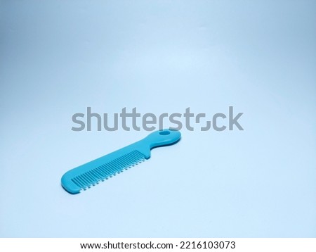 Children's hair comb on white background
