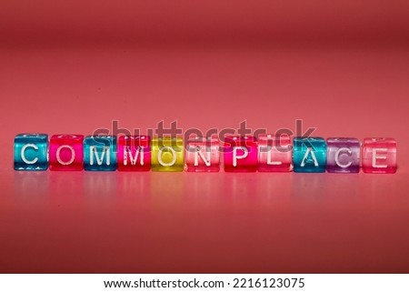the word "commonplace" made up of cubes	
 Royalty-Free Stock Photo #2216123075