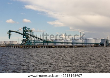 an empty port chemical cargo terminal on river Royalty-Free Stock Photo #2216148907
