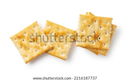 Crackers placed on top of each other on a white background. Viewed from above. Royalty-Free Stock Photo #2216187737