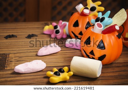 Candies with pumpkins in Halloween festivities