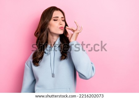 Portrait of nice person closed eyes pouted lips arm fingers make italian gourmet gesture isolated on pink color background
