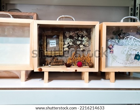 wooden frames for tables, home interior accessories made by SMEs in Indonesia at a shop by souvenirs