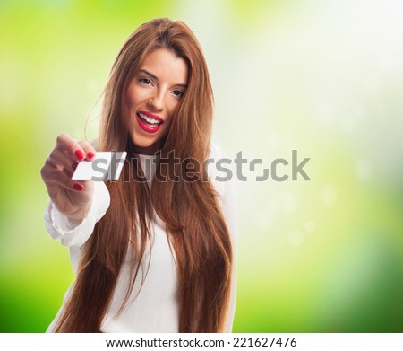 portrait of a pretty woman giving a credit card