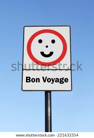 A road traffic sign with a Bon Voyage concept with a clear blue sky background.