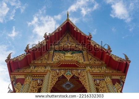 Beautiful  Thai  style  temple  with blue  sky  background  at  Wat  Lahan  Yai ,famous  attractions  landmark , Rayong   Province , Thailand .
