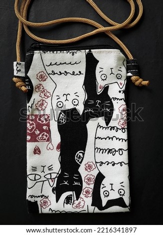 small bag with cat pattern