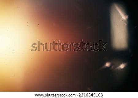 Background of retro film overly, image with scratch, dust and light leaks Royalty-Free Stock Photo #2216345103