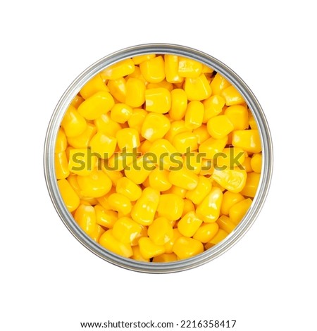 Sweet corn kernels, in an opened can. Cooked canned yellow vegetable maize, Zea mays, also called sugar or pole corn, vegetarian staple food. Isolated from above, close-up over white macro food photo. Royalty-Free Stock Photo #2216358417