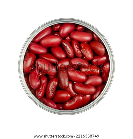 Red kidney beans, in an opened can. Cooked and canned common kidney beans, a variety of the common bean, Phaseolus vulgaris, a vegetarian staple food. Isolated, from above, close-up, macro food photo. Royalty-Free Stock Photo #2216358749